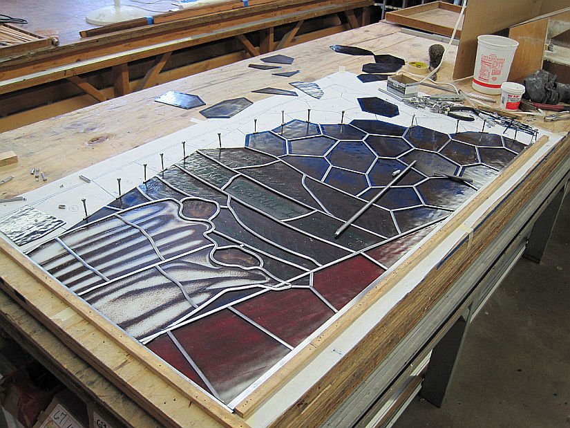 Inserting stained glass pieces and lead came